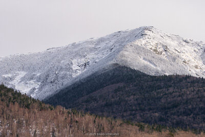 A panorama photo of snow and ice covering Mount Lincoln in the White Mountains of New Hampshire.